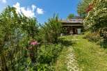 Discover a charming property nestled amidst lush greenery.