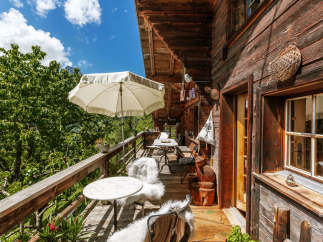 Enjoy the tranquility of this charming wooden chalet with a beautiful balcony.