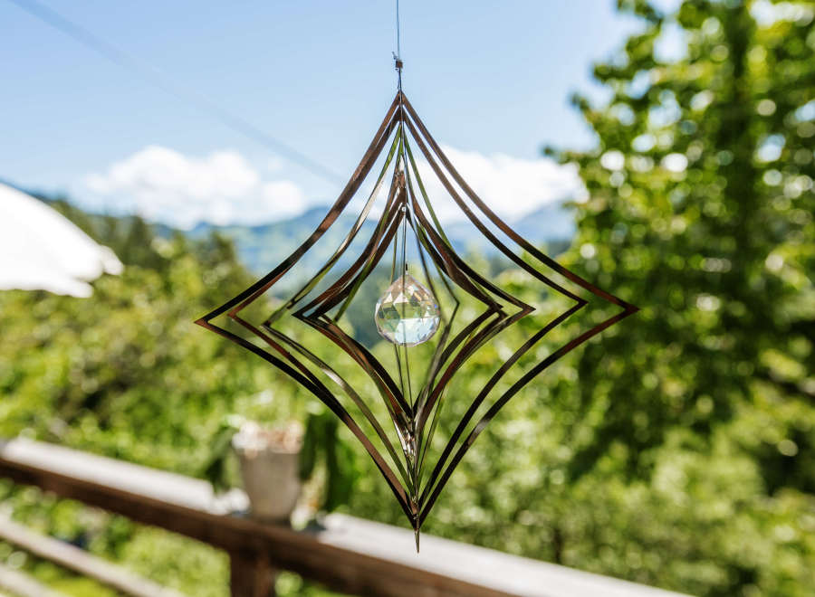 This stunning outdoor decor features a unique geometric design, perfect for adding a touch of elegance to your patio or garden.