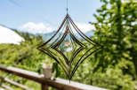 This stunning outdoor decor features a unique geometric design, perfect for adding a touch of elegance to your patio or garden.