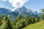 Explore the breathtaking beauty of the mountains, where nature's artistry unfolds.