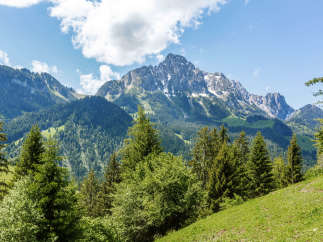 Explore the breathtaking beauty of the mountains, where nature's artistry unfolds.