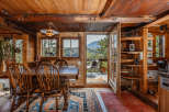 Step into a cozy cabin retreat with stunning wooden interiors and a warm, inviting atmosphere.