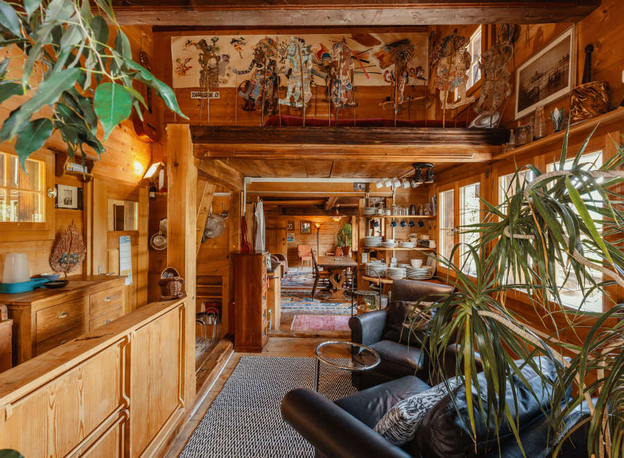 Step into a cozy, rustic haven with this inviting interior.