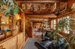Step into a cozy, rustic haven with this inviting interior.