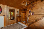 Step into a rustic haven with this charming wooden interior.