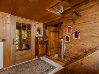Step into a rustic haven with this charming wooden interior.