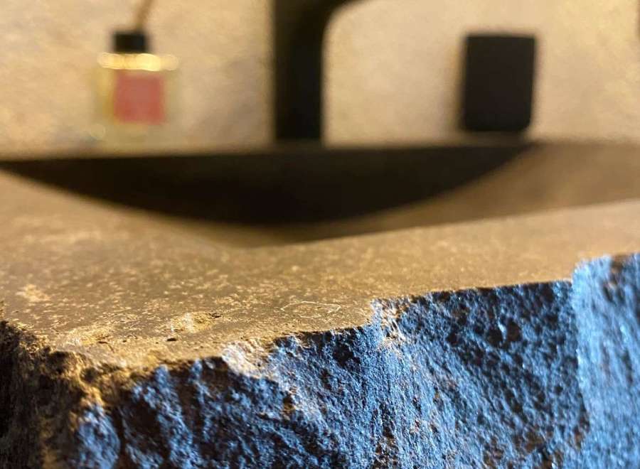 Discover the unique charm of this property, featuring a stunning stone sink that adds a touch of natural elegance.