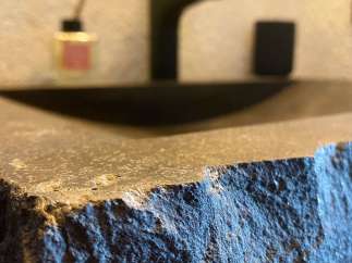 Discover the unique charm of this property, featuring a stunning stone sink that adds a touch of natural elegance.