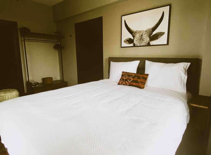 Experience comfort and style in this beautifully designed bedroom.