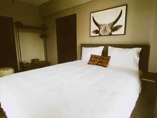 Experience comfort and style in this beautifully designed bedroom.