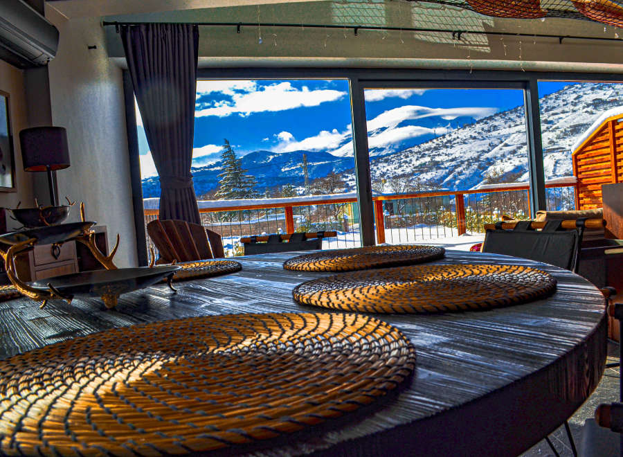 Enjoy breathtaking mountain views from this cozy retreat.