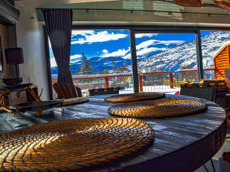 Enjoy breathtaking mountain views from this cozy retreat.