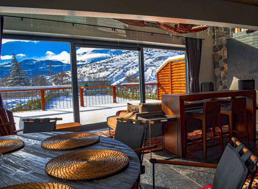 Experience the ultimate winter escape in this stunning mountain retreat.