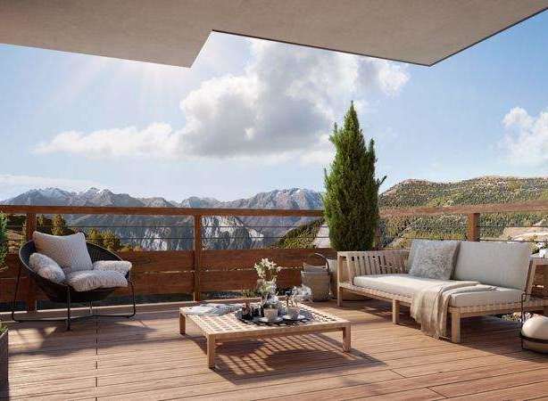 Enjoy breathtaking mountain views from this stunning outdoor terrace.
