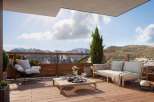 Enjoy breathtaking mountain views from this stunning outdoor terrace.