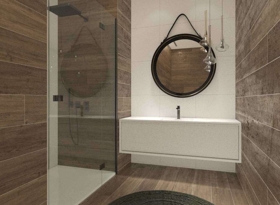 This modern bathroom features a sleek design with wood-look tiles and a glass shower enclosure.