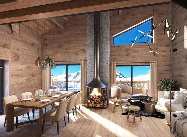 Experience luxury living in this stunning chalet, boasting a cozy fireplace and breathtaking mountain views.
