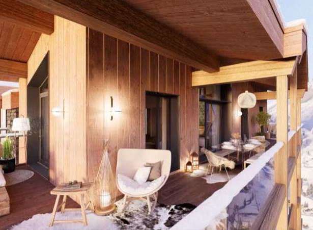 Experience luxury living with this stunning property featuring a beautiful wooden balcony.