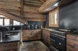 Experience rustic elegance in this stunning kitchen.