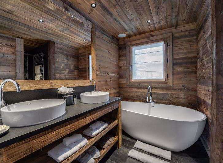 Experience rustic luxury in this stunning bathroom.