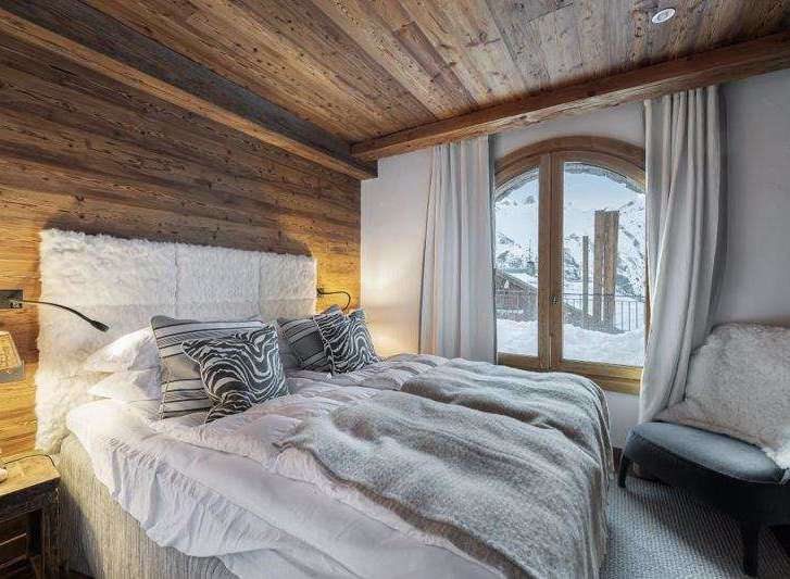 Experience the ultimate in alpine luxury in this stunning bedroom.