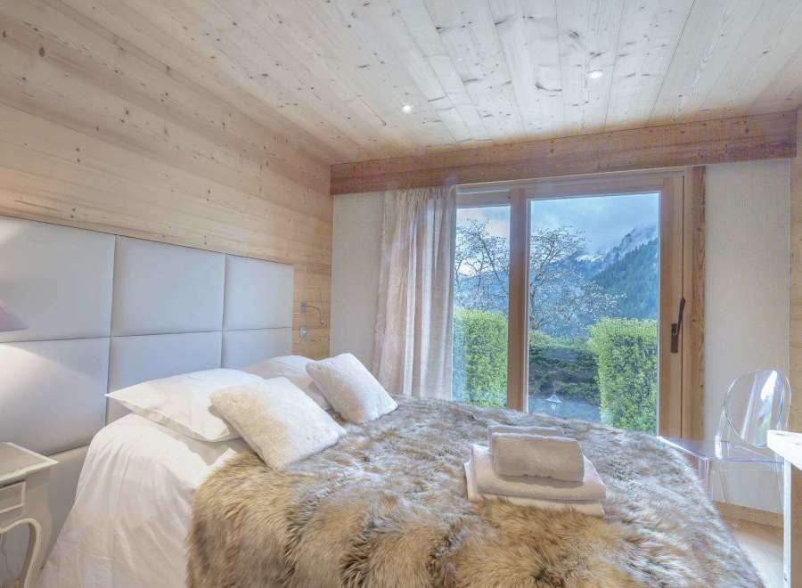 Experience the ultimate in alpine luxury in this stunning bedroom.