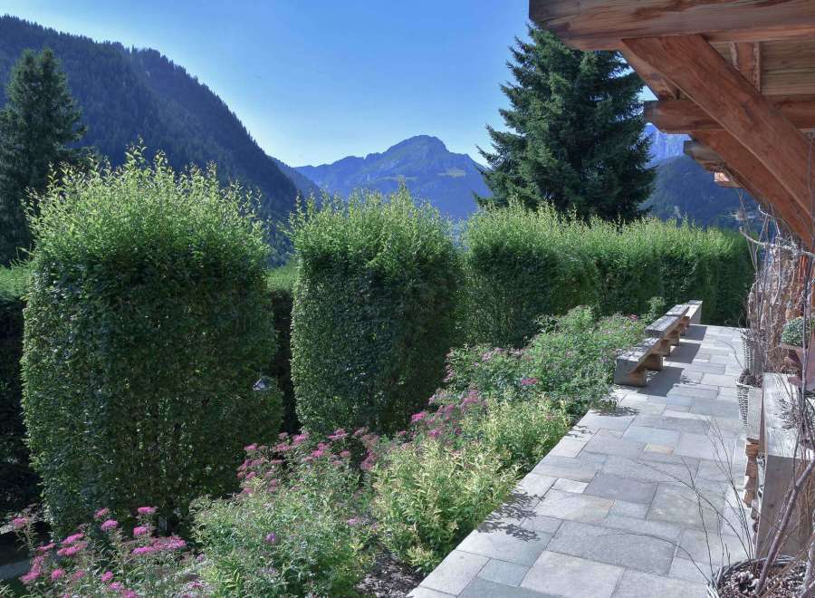 Experience the tranquility of this stunning property, nestled amidst breathtaking mountain views.