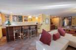 This property boasts a stylish bar area, perfect for entertaining guests.