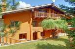 Discover a charming chalet nestled in a picturesque setting.