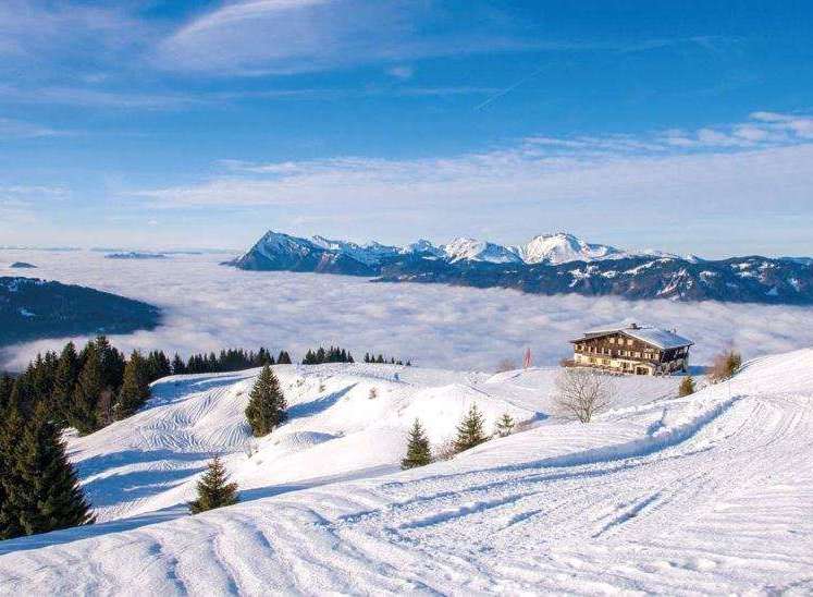 Experience the breathtaking beauty of this mountain retreat, nestled amidst a stunning winter wonderland.