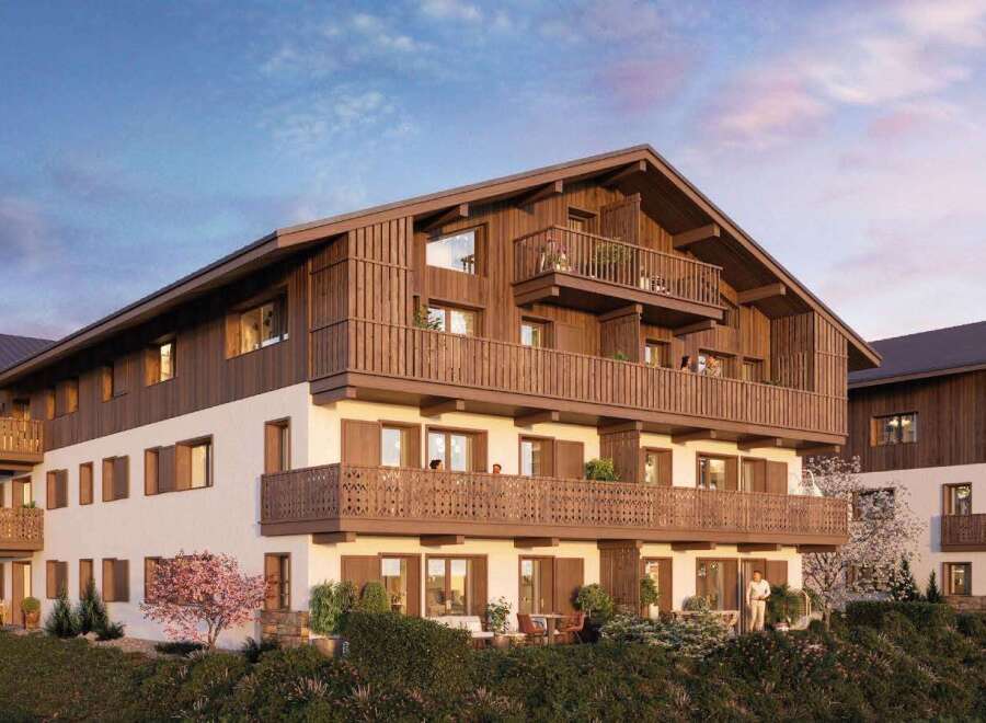 Experience luxurious alpine living in this stunning property, featuring a modern design with traditional wooden accents.