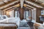Experience the ultimate in alpine luxury in this stunning bedroom.