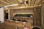 Experience rustic elegance in this stunning kitchen and dining area.