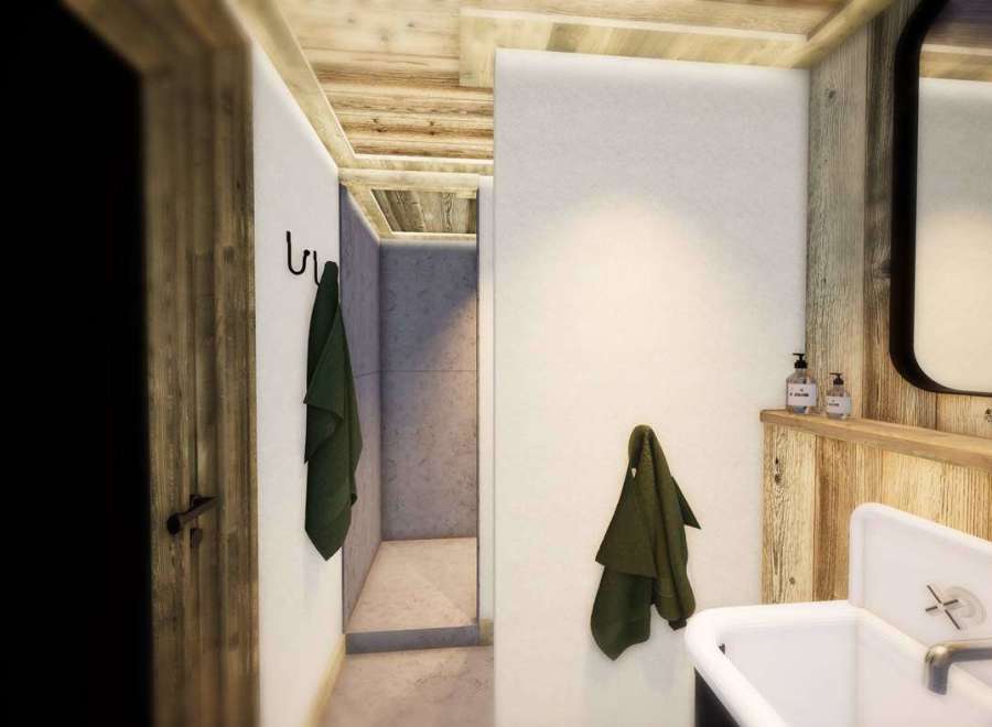 This charming bathroom features a rustic wooden ceiling and walls, creating a warm and inviting atmosphere.