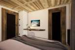 Experience the cozy charm of this beautifully designed room.