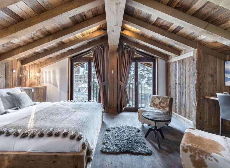 Experience the ultimate in alpine luxury in this stunning bedroom.