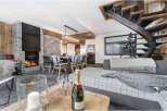 Experience luxury living in this stunning property, featuring a cozy fireplace perfect for chilly evenings.