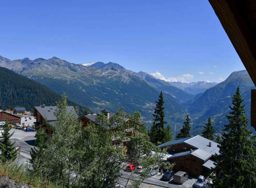 Experience breathtaking mountain views from this charming chalet.