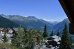 Experience breathtaking mountain views from this charming chalet.