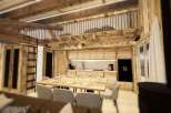 Experience rustic charm in this stunning chalet, featuring exposed wooden beams and a cozy ambiance.
