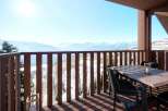 Enjoy breathtaking mountain views from this stunning balcony.