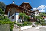 Discover the charm of this stunning property, showcasing a beautiful blend of wood and white exterior.