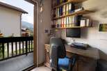 Enjoy the stunning mountain views from this charming home office.