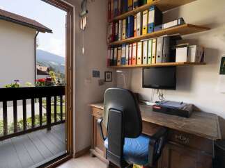 Enjoy the stunning mountain views from this charming home office.