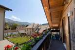 Enjoy breathtaking mountain views from this charming balcony.