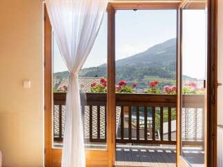 Enjoy breathtaking mountain views from this charming property.