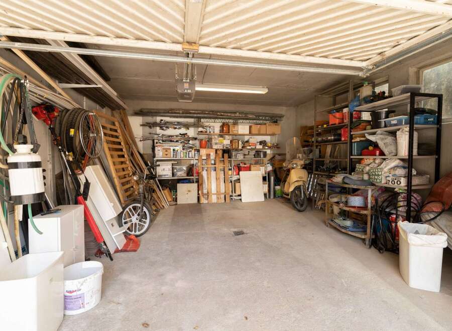 Explore this well-organized garage, perfect for storage and hobbies.