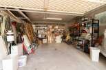 Explore this well-organized garage, perfect for storage and hobbies.