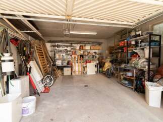 Explore this well-organized garage, perfect for storage and hobbies.